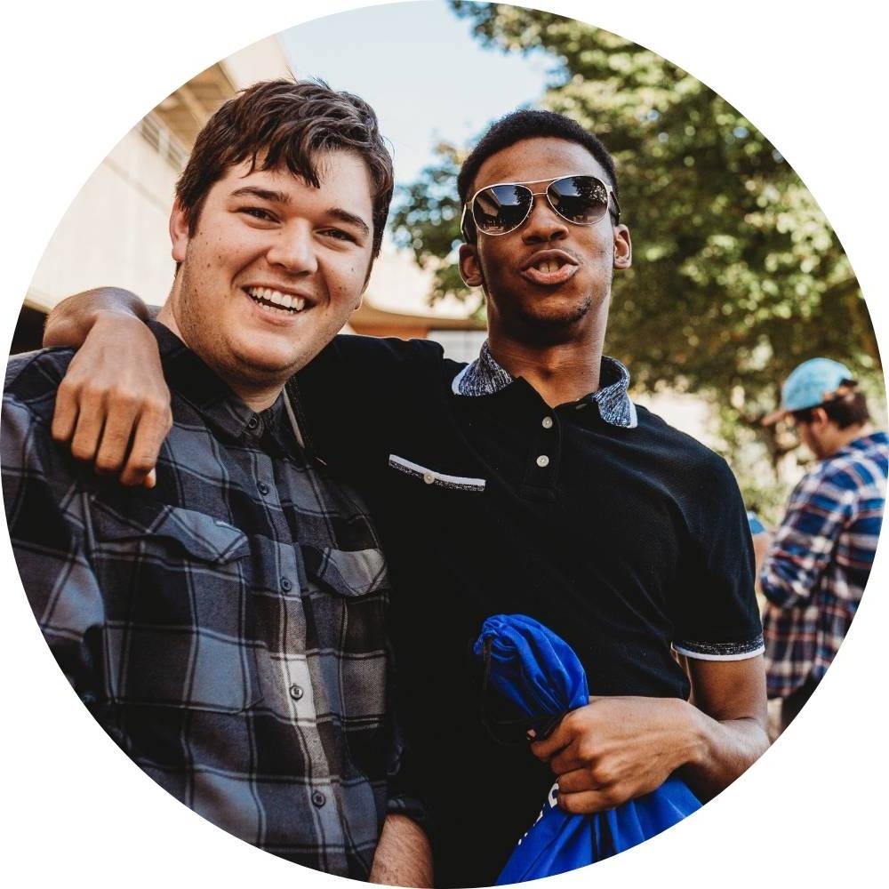 photo of students smiling at camera during Welcome Day event